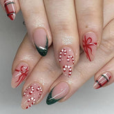 Sevgob Christmas press-on nails in almond shape with festive gift design for quick holiday glam