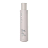 Shani Darden Sake Nourishing Essence bottle close-up showcases hydration and calm for dehydrated skin