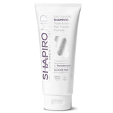 Shapiro MD shampoo bottle shows vegan DHT fighting formula for fuller hair