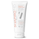Shapiro MD Leave-In Conditioner bottle close-up for scalp nourishment.