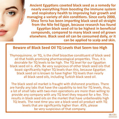 Shea Terra Egyptian Black Seed Oil droplet on skin for gentle moisture
