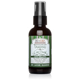 Shea Terra Madagascar Tamanu oil bottle close-up, showcasing rich hydration for skin.