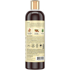 Shampoo bottle back label explains Fair-Trade Shea Butter and nourishing formula