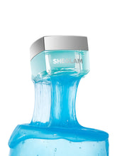 SHEGLAM HydroSlime Primer bottle close-up, jelly slime texture readying skin for makeup.