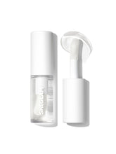 SHEGLAM Jelly Wow lip oil bottle closeup showing radiant shine.