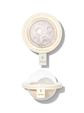 SHEGLAM Lunar Glow Highlighter compact radiates soft gold shimmer for cheeks.