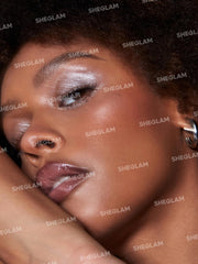 SHEGLAM Enigma Sparkly Eyeshadow single delivers lightweight, sheer glow for comfortable use.