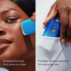 Applying Shiseido Clear Sunscreen Stick SPF 50+ under makeup during outdoor activities.