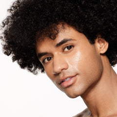 Sunlit face showing natural glow and hydrating feel during wear.