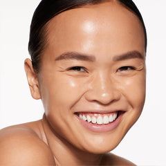 Shiseido RevitalEssence Maple foundation tester on hand demonstrating long wear.