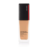 Shiseido Synchro Skin self-refreshing foundation bottle showing buildable coverage.
