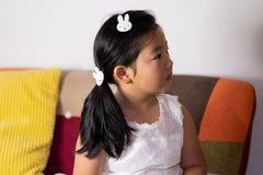 SHOBIDO Miffy die-cut bangs clip back view shows secure grip.