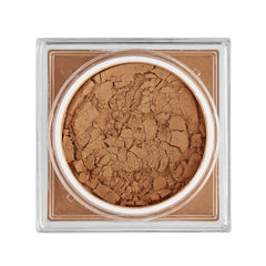 Sigma Beauty loose setting powder jar closeup highlights airy texture and light coverage.