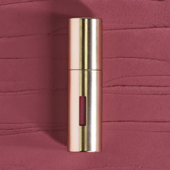 Lip application closeup highlights soft-matte finish and featherweight feel for smooth lips