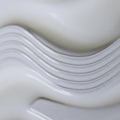 Sisley Paris Curl Care Jelly texture on hand demonstrates creamy, smooth application.