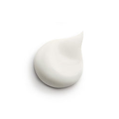 Sisley Paris Ecological Compound texture swatch showcases non-greasy, matte finish for all skin types.
