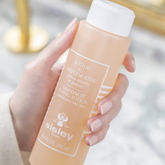 Close-up of the Grapefruit Toning Lotion imparting a fresh, matte finish on skin