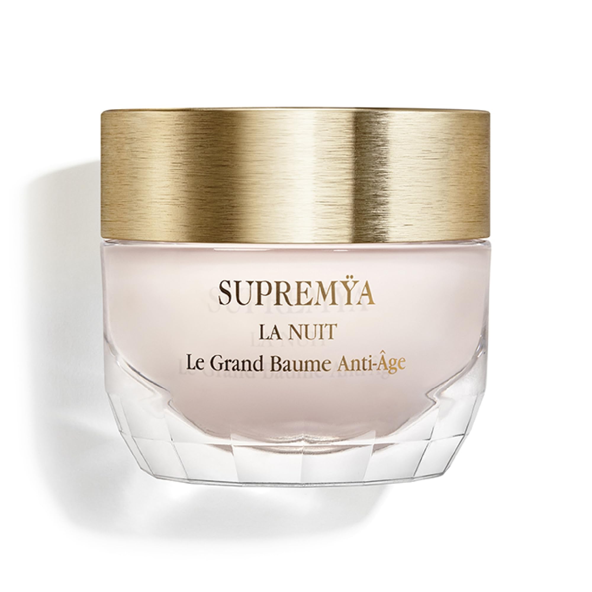Sisley Supremya at Night bottle shown in soft light, suggesting nighttime renewal
