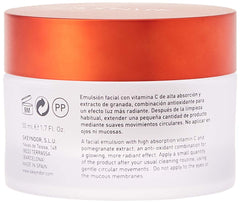 Skeyndor Power C+ energizing emulsion texture on hand showing fast-absorbing formula for daily use