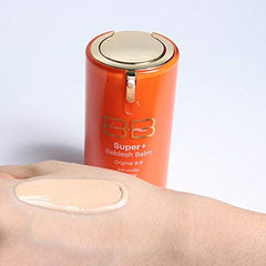 SKIN79 Orange BB Cream texture closeup highlighting pearl glow for a smooth finish
