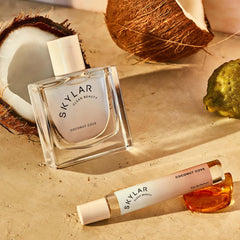 Skylar Coconut Cove base notes ambrox and coastal woods deepen the fragrance
