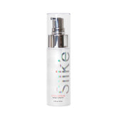 Sleek'e Silk'e hair serum bottle close-up showing frizz control and silky shine.
