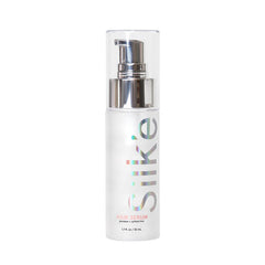 Sleek'e Silk'e hair serum bottle close-up showing frizz control and silky shine.