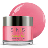 SNS Nail Dip Powder Classy Cocktail Dress pink shimmer swatch showcases rich color and radiant shine.