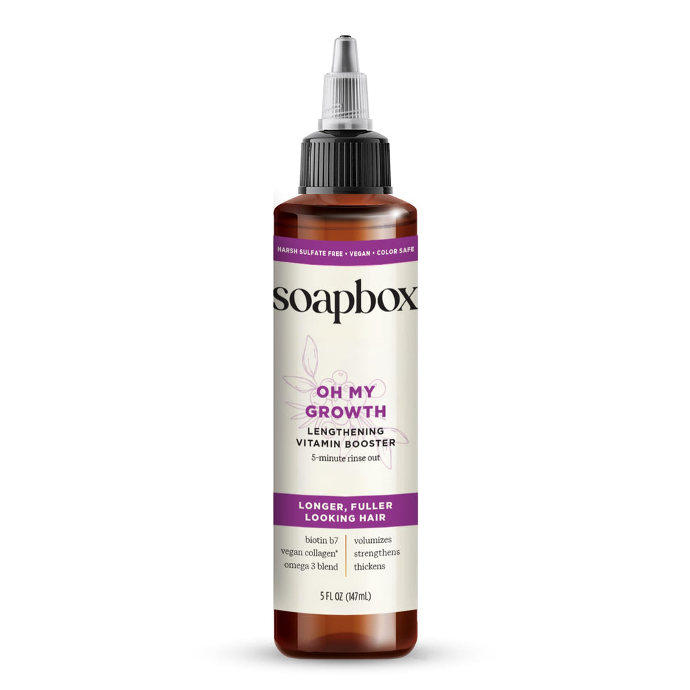 Soapbox Oh My Growth bottle pour highlights a lightweight, non-greasy formula for easy application.