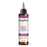 Soapbox Oh My Growth bottle pour highlights a lightweight, non-greasy formula for easy application.