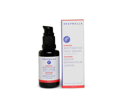 Soapwalla Restorative Facial Serum ingredients close-up highlight rosehip and carrot oils.