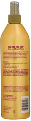 Hands misting Care Free Curl Gold onto damp curls for moisture