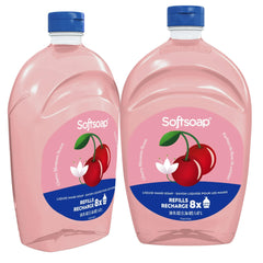 Pouring Softsoap Meyer Lemon into a pump at a sink