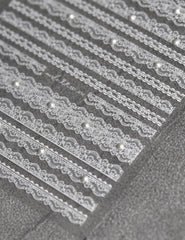 SOFTSOUL Embossed pearl detail close-up for premium nail texture at home.