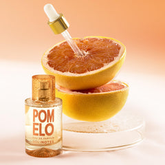 Solinotes Pomelo with jasmine and melon heart for a joyful aura.