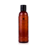 SPA CEYLON Sandalwood Vetiver Gentle Cleanser bottle pour promotes balanced scalp and gentle shine.