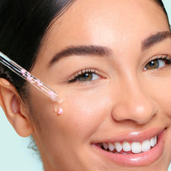 SpaLife pearl capsules dissolve to add instant luminosity to hydrated skin.