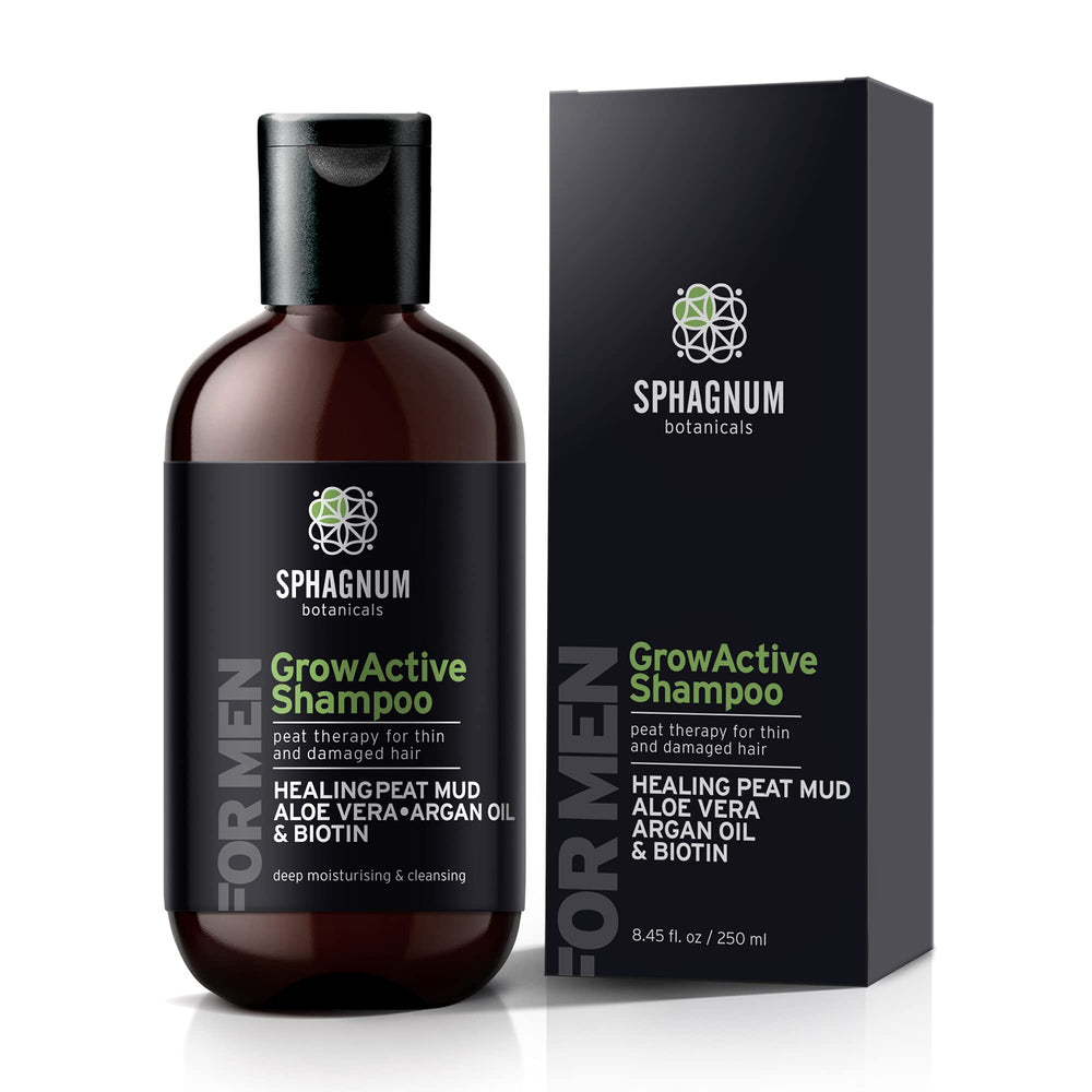 Sphagnum Botanicals Hair Growth Shampoo bottle on wood for stronger-looking hair.
