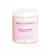 SPICE BEAUTY Goat Milk & Rose soak bottle pour for a relaxing post-workout unwind.