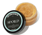Spoild Batana Oil bottle 2oz for nourishing hair growth.