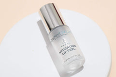 StackedSkincare lip primer application scene for smoother lips.