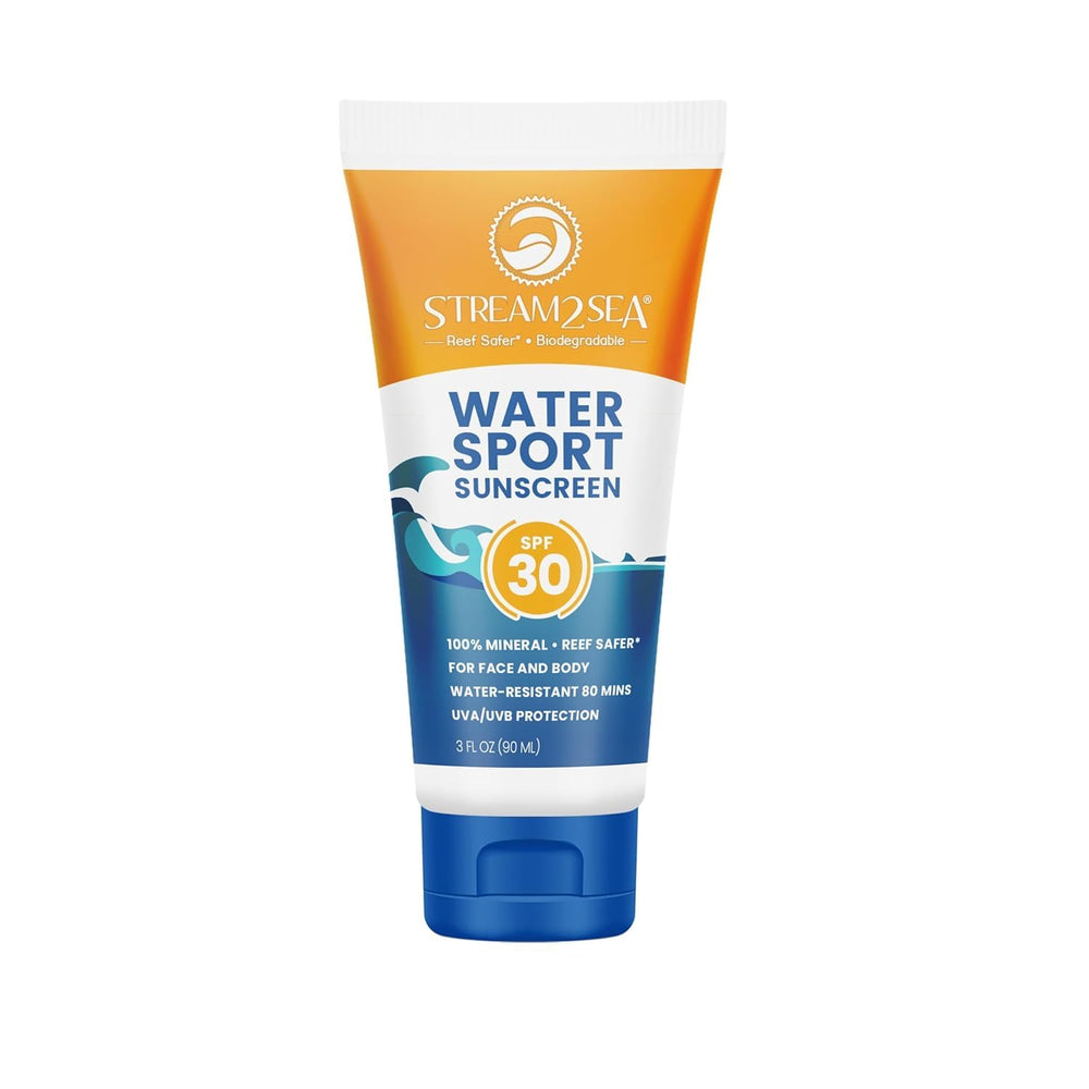 STREAM 2 SEA SPF 30 mineral sunscreen bottle on a beach, reef-safe protection.