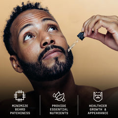 Striking Viking beard oil dropper enables precise, mess-free application.