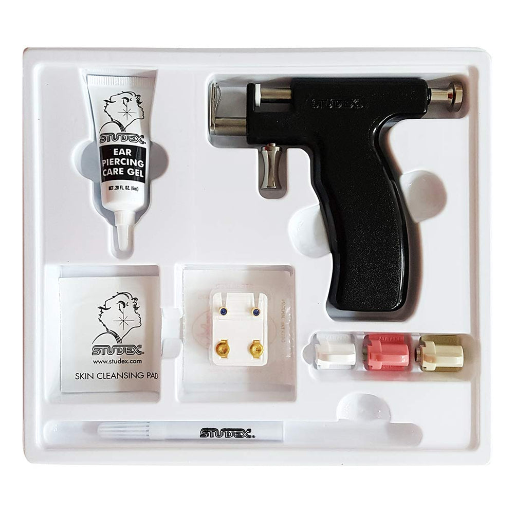 Studex ear-piercing gun kit with marker gel for precise placement during at-home piercings.