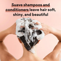 Suave Almond & Shea Butter detangling conditioner being applied for moisture.