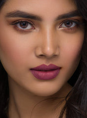 SUGAR lip crayon on lips with long-wear matte finish