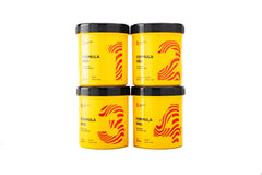 Sugaring Labs paste for arm application; balanced formula for versatile at-home uses.