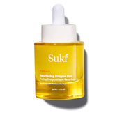 Suki Resurfacing Enzyme Peel bottle on a clean vanity for gentle exfoliation