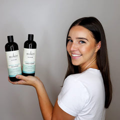 Sukin Natural Balance Shampoo hair wet shows easy distribution for normal hair.