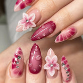 SUMINGGO press-on nails almond shape with purple waterdrop flower for quick at-home glamour.